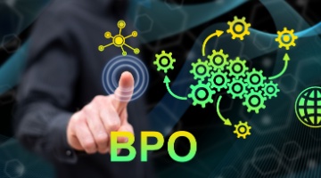 close-up of a businessperson touching a digital interface with “bpo” text and connected gear icons, illustrating outsourced workflows and bpo services.
