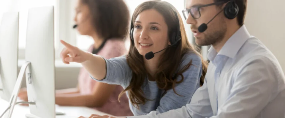 Two call center agents working