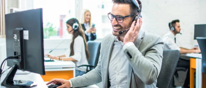 man on headset in call center