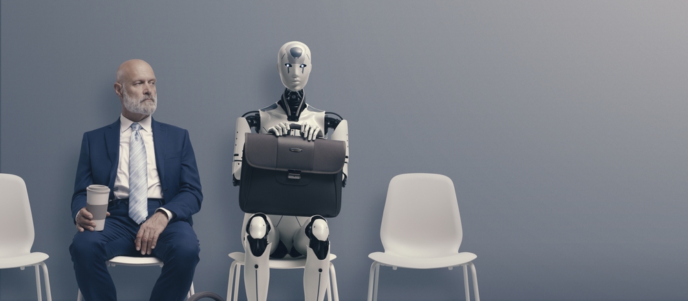 Business professional sitting beside a robot, representing the comparison between BPO and AI.