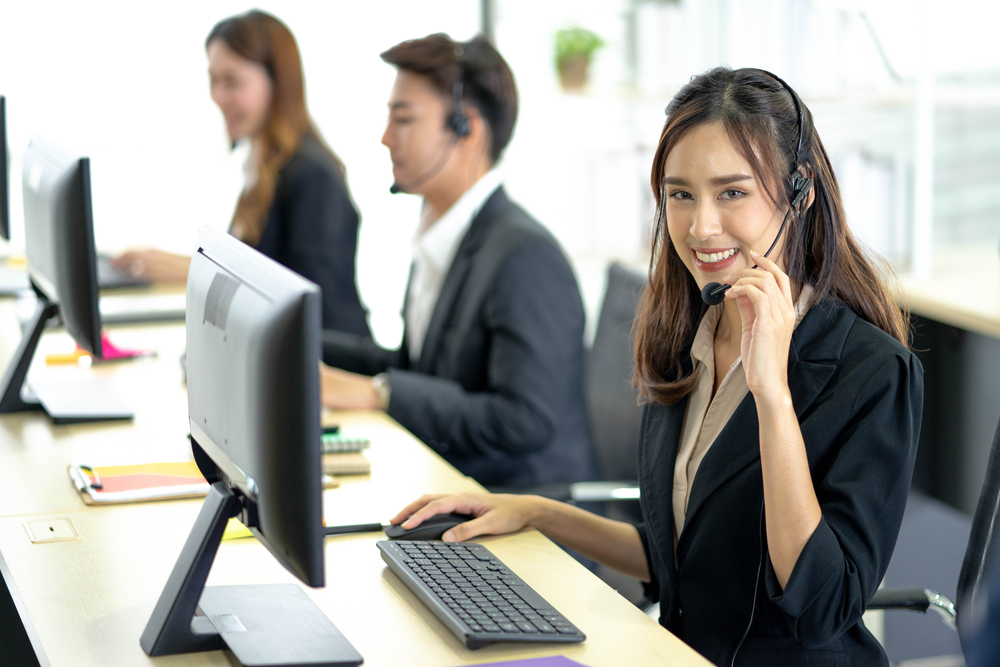 call center agents sitting in front of computers