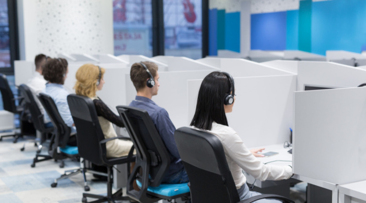 call center agents sitting at desks