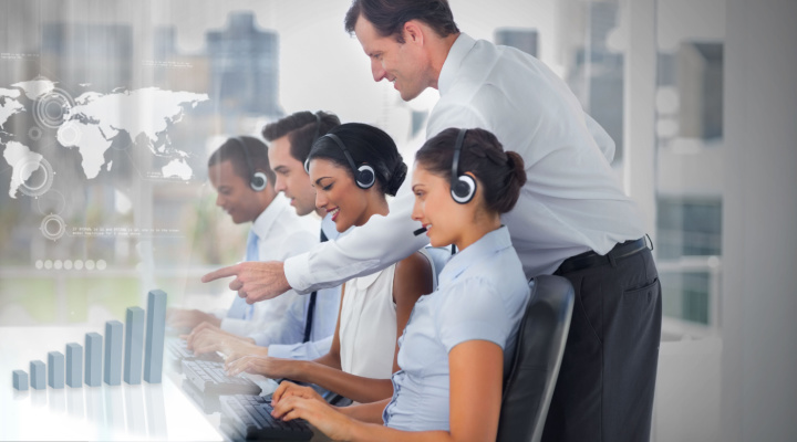 manager helps call center employees in futuristic image