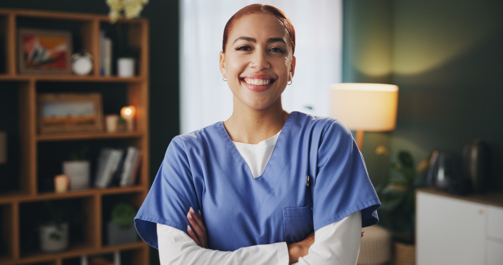 Smiling healthcare worker at home office representing professional support through outsourcing medical billing.