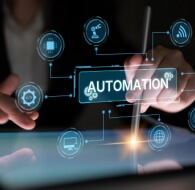 Person uses a stylus on a digital screen with an “Automation” interface and connected tech icons, representing hyperautomation in BPO.