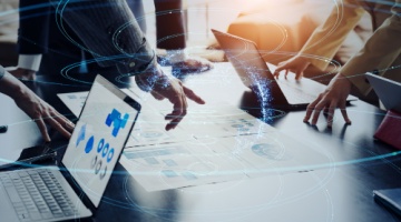 Business team in a meeting discussing plans, illustrating how BPO supercharges your marketing strategy through collaboration and expertise-1