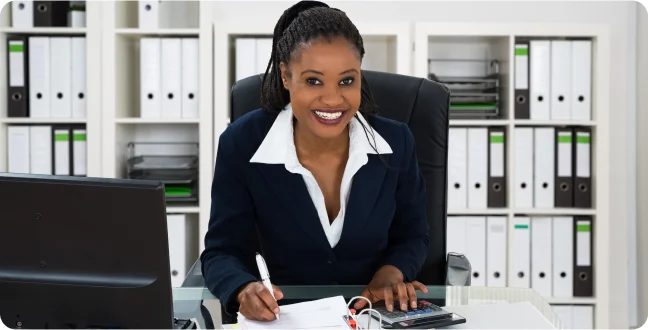 Front view of a business woman in an office background