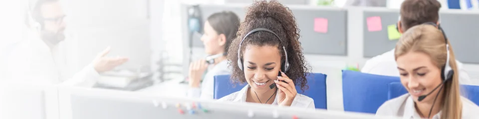 Two happy female customer services agents