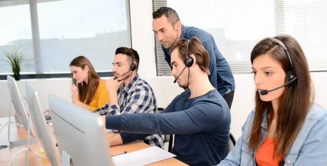 Four call center agents and a supervisor.