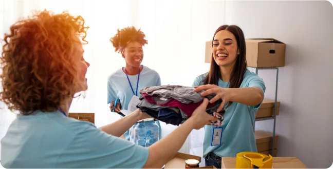 Youngers giving clothes to charity