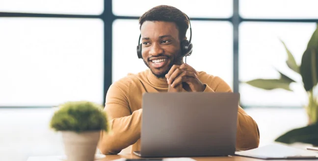 Male call center agent working from home.